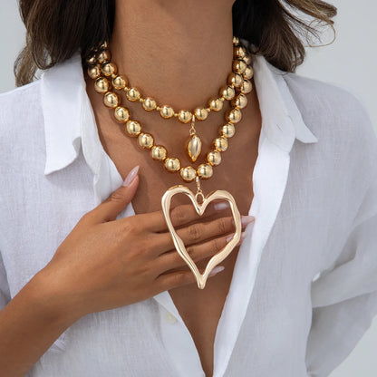 Set de Colgantes Latido de Oro