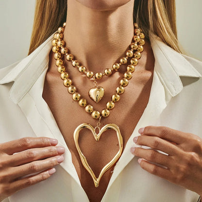 Set de Colgantes Latido de Oro