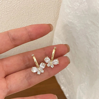 Pendientes Mariposa - Moissanita y Oro 18k