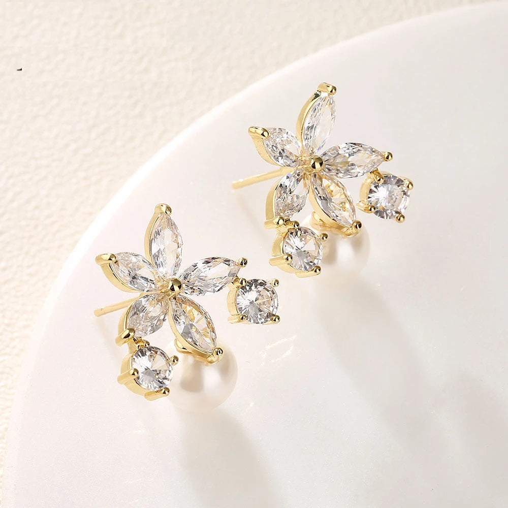 Pendientes Flor de Luz - Moissanita y Oro 18k