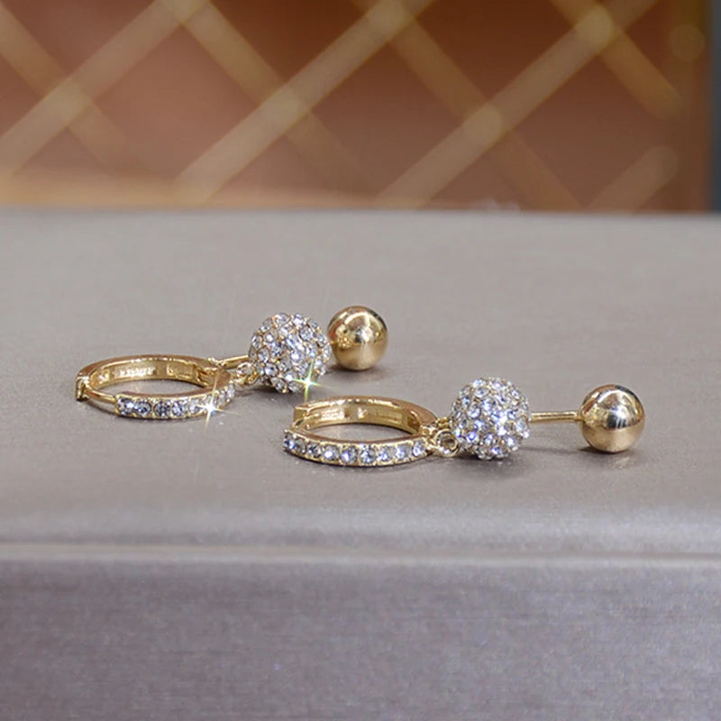 Pendientes Brillo Eterno - Zirconita y Oro 18k