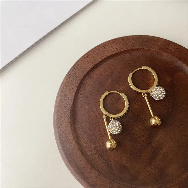Pendientes Brillo Eterno - Zirconita y Oro 18k