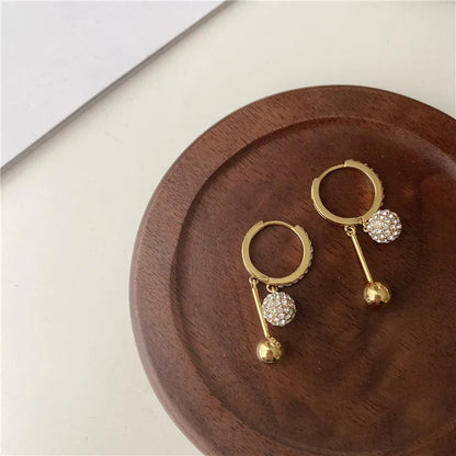 Pendientes Brillo Eterno - Zirconita y Oro 18k